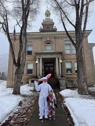 The Easter Bunny (Sterling Blankenship) and Willow Blankenship in front of SJC Courthouse. Photo credit Sterling Blankenship